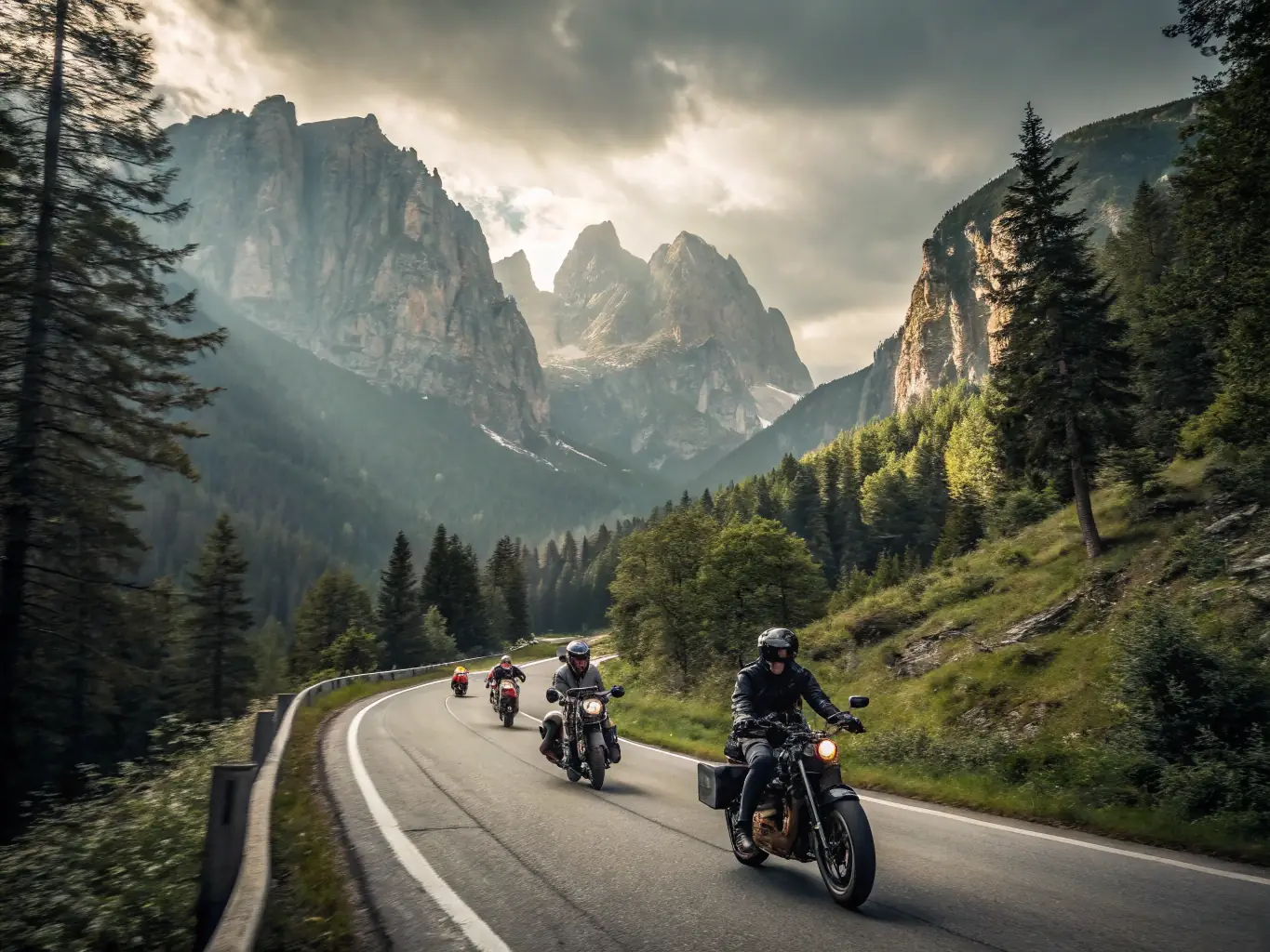 A group of BMP BALADES MOTOS PASSION members riding motorcycles through a winding mountain road on a sunny day, showcasing the scenic beauty and camaraderie of the ride.