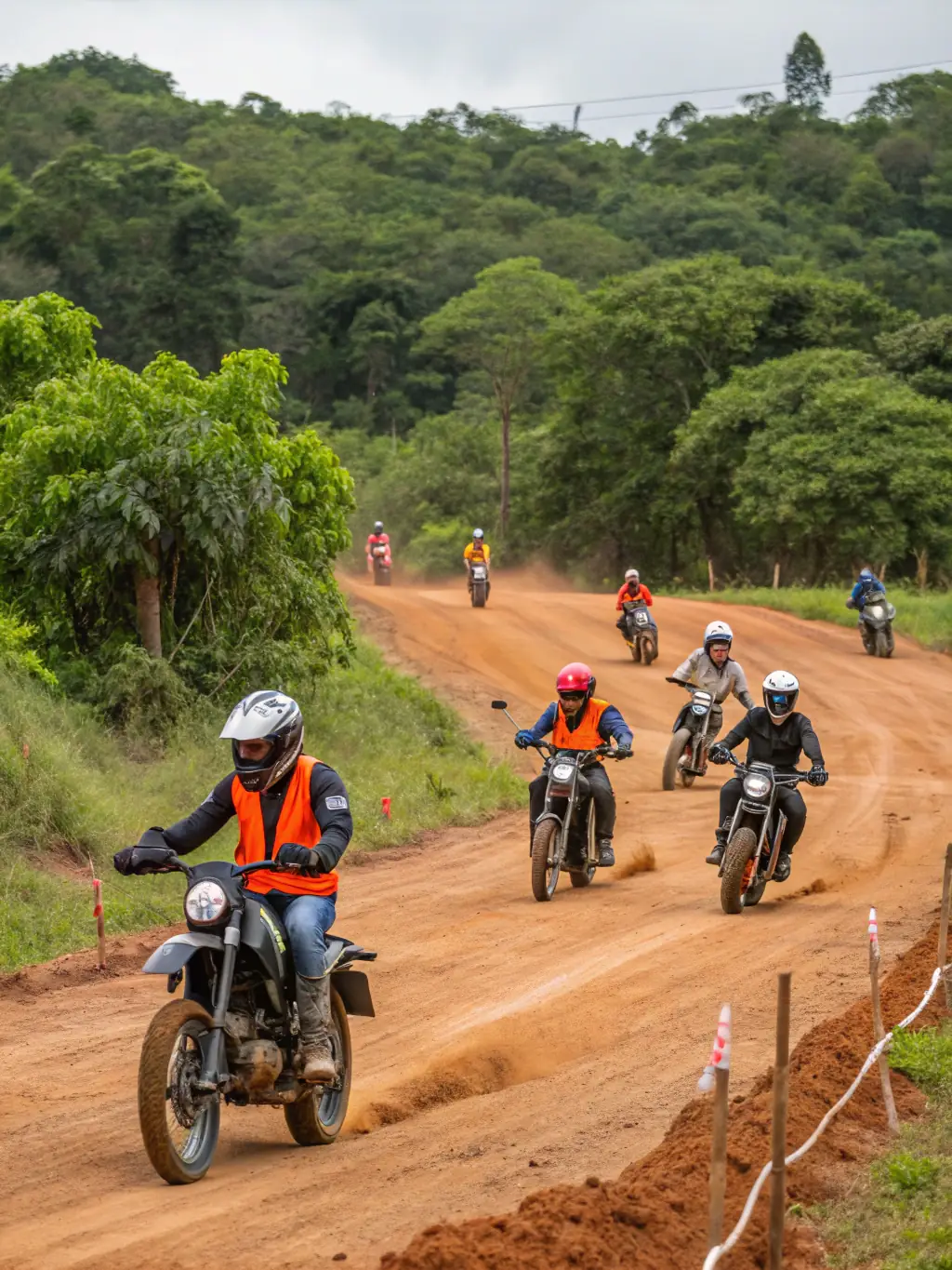 A diverse group of motorcyclists participating in a safety training session organized by BMP BALADES MOTOS PASSION, emphasizing the organization's commitment to safe riding practices.